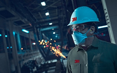 Worker wearing a face mask